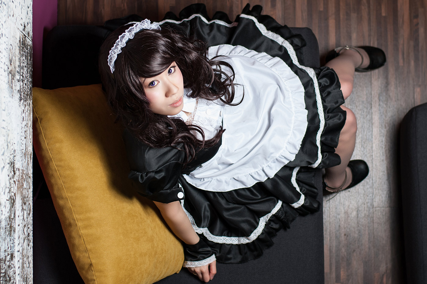 Image of a beautiful young woman wearing a maids uniform